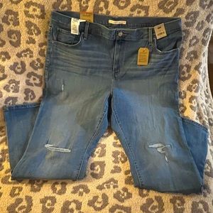 Levi’s 724 plus size distressed jeans.